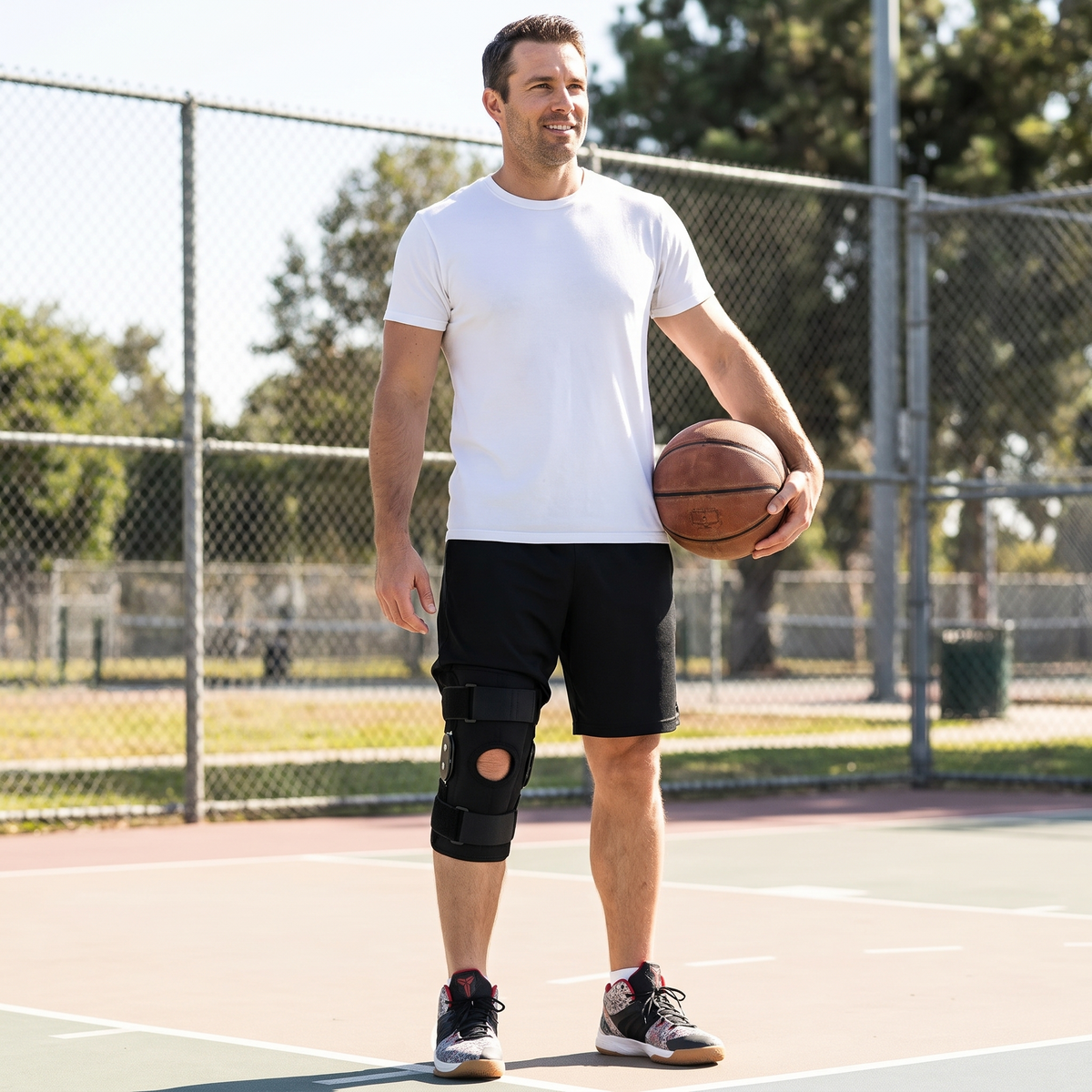 Hinged knee brace worn on the basketball court